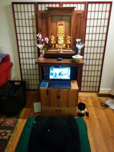 Home altar with computer ready for services