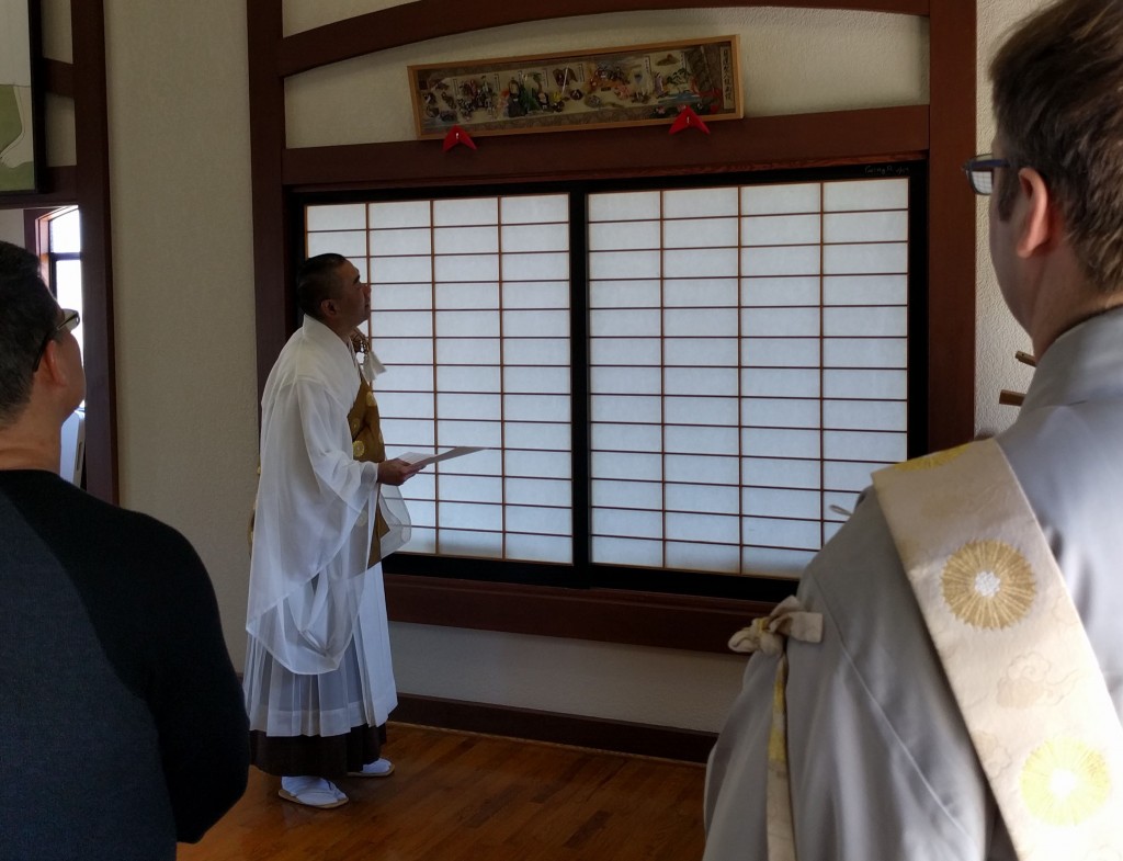 Rev. Arnold Matsuda discusses diorama of Nichiren's life