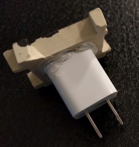 Stamp is glued to surplus USB charger